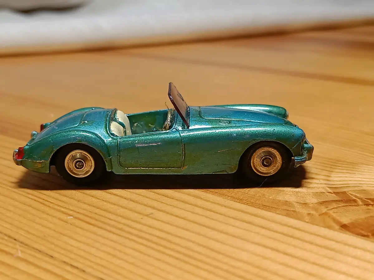 302 Mga In Metallic Blue-Green With Cream Seats 1