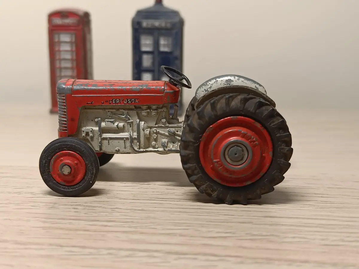 50 Massey Ferguson 65 Tractor With Red Seats 1