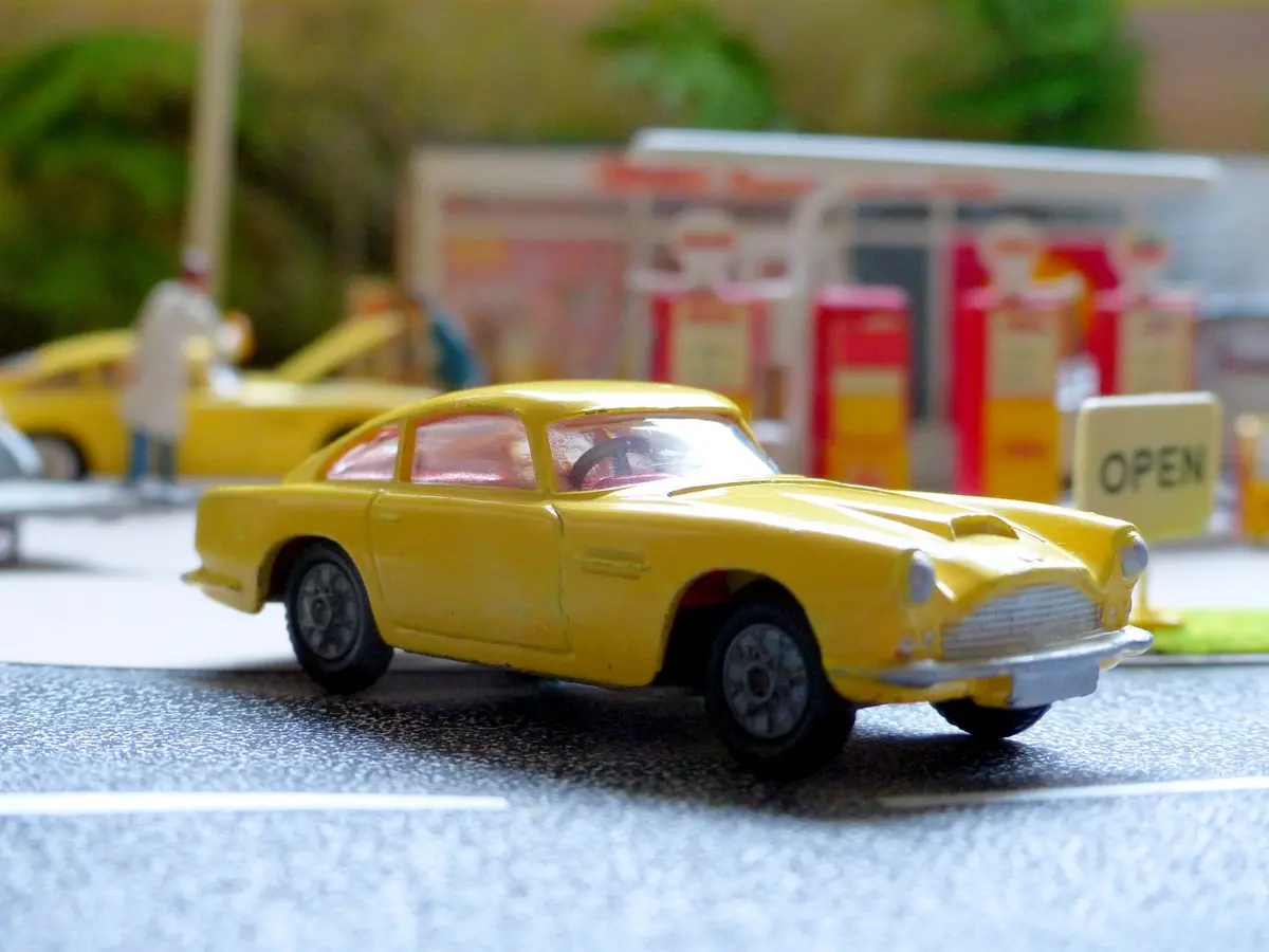 218 Aston Martin In Yellow With Cast Wheels 2