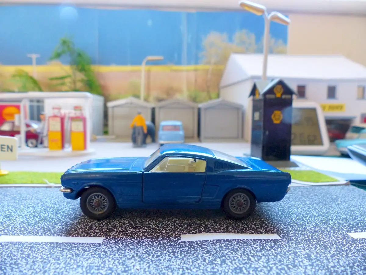 320 Ford Mustang In Metallic Blue With Wire Wheels 1