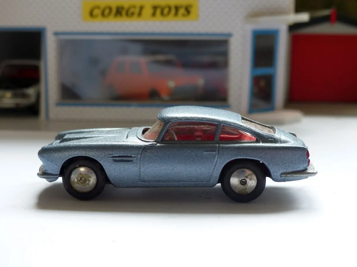 218 Aston Martin In Silver With Red Interior 1